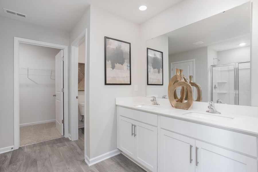 Furnished interior in a model home at The Grove at Riley's Meadow in Haw River (Image 15).