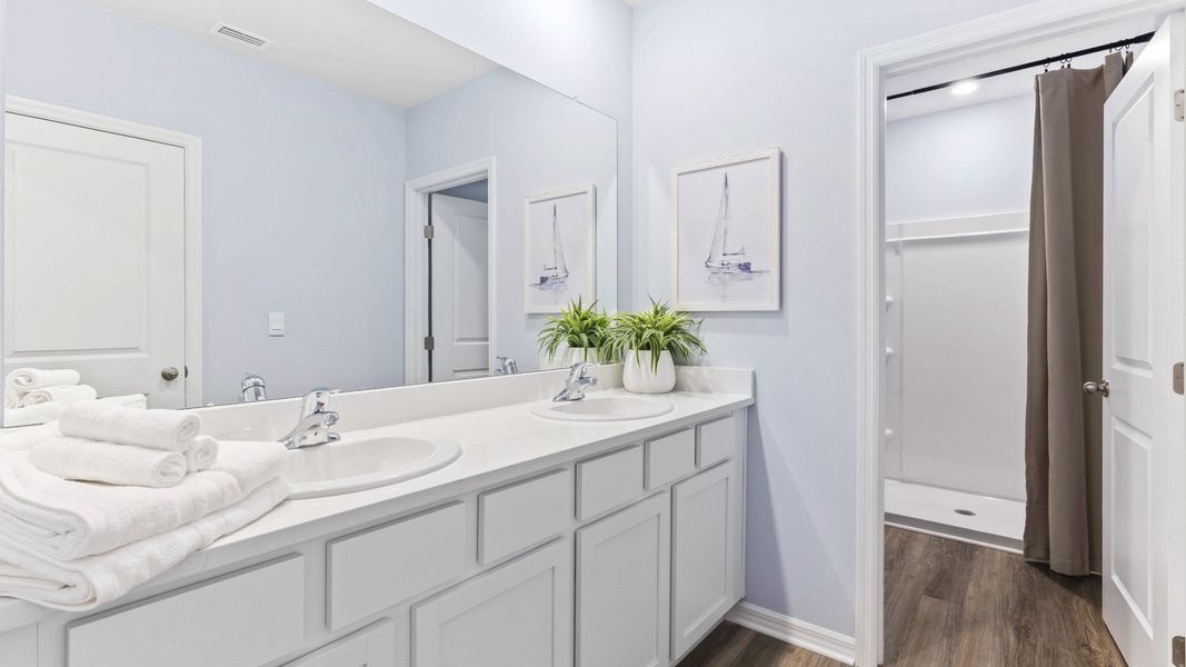 Furnished interior in a model home at The Gardens at Bay Street in Sarasota (Image 15).