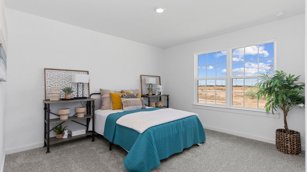 Furnished interior in a model home at August Trails in Needville (Image 8).