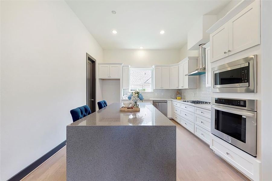 Furnished interior in a model home at Edwards in The Woodlands (Image 11).