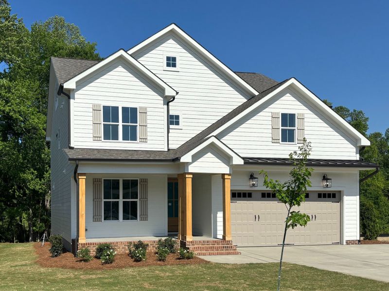 Front exterior of a home in the Forest Bluff Estates community, located in Fuquay Varina, NC (Image 15). Front exterior of a home in the Forest Bluff Estates community, located in Fuquay Varina, NC (Image 15).