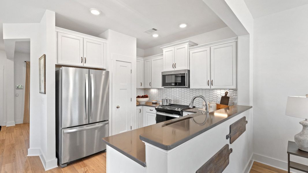 Furnished interior in a model home at Clarke Townes in Anderson (Image 8).