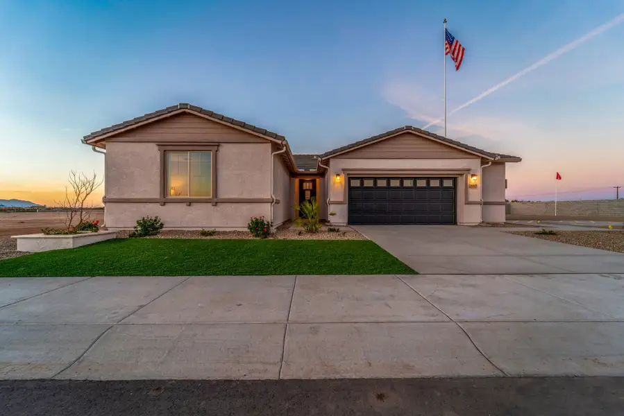 Front exterior of a home in the Rancho Mirage community, located in Maricopa, AZ (Image 9). Front exterior of a home in the Rancho Mirage community, located in Maricopa, AZ (Image 9).