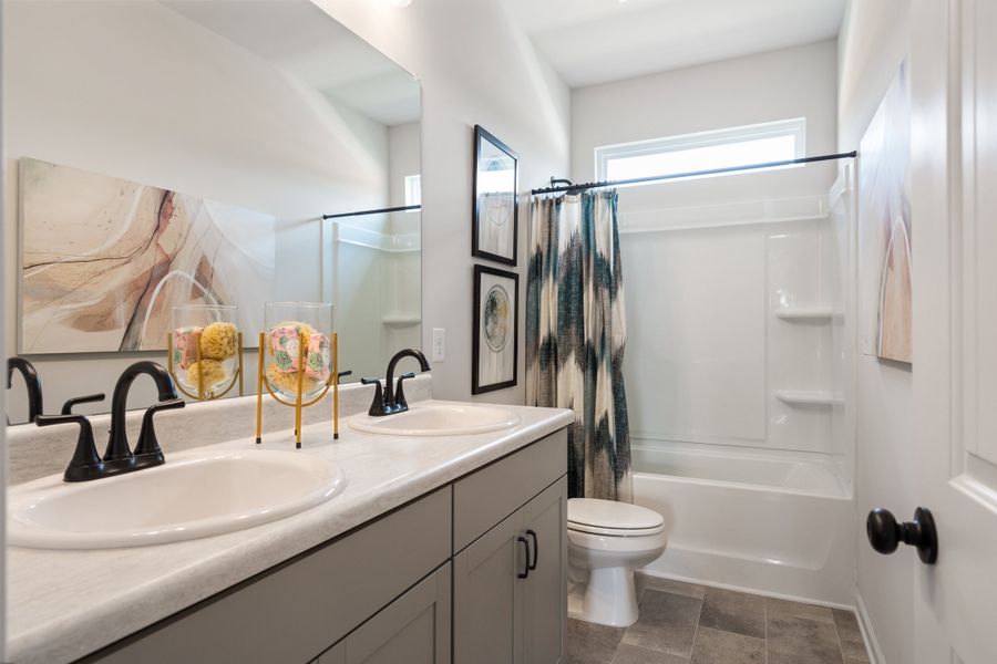 Furnished interior in a model home at Vandiver Creek in South Fulton (Image 36).