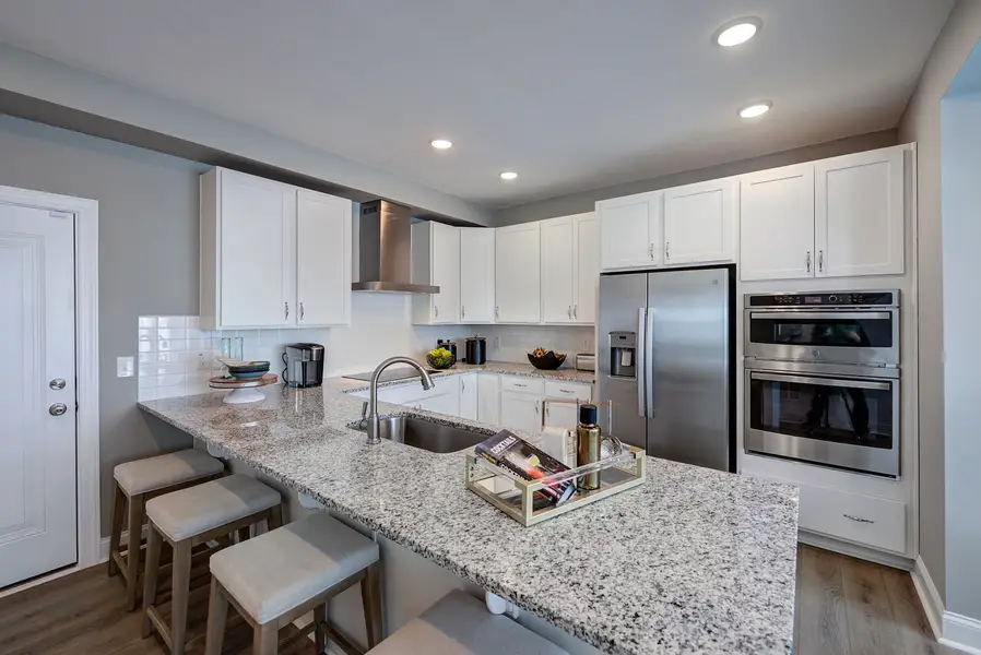 Furnished interior in a model home at Magnolia in Wake Forest (Image 6).