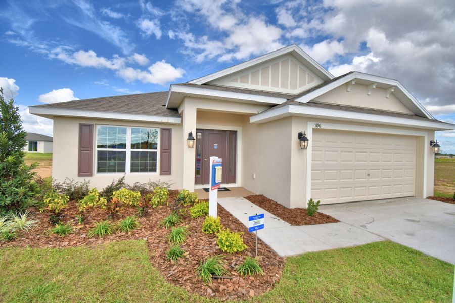 Front exterior of a home in the Citrus Landing community, located in Davenport, FL (Image 8).