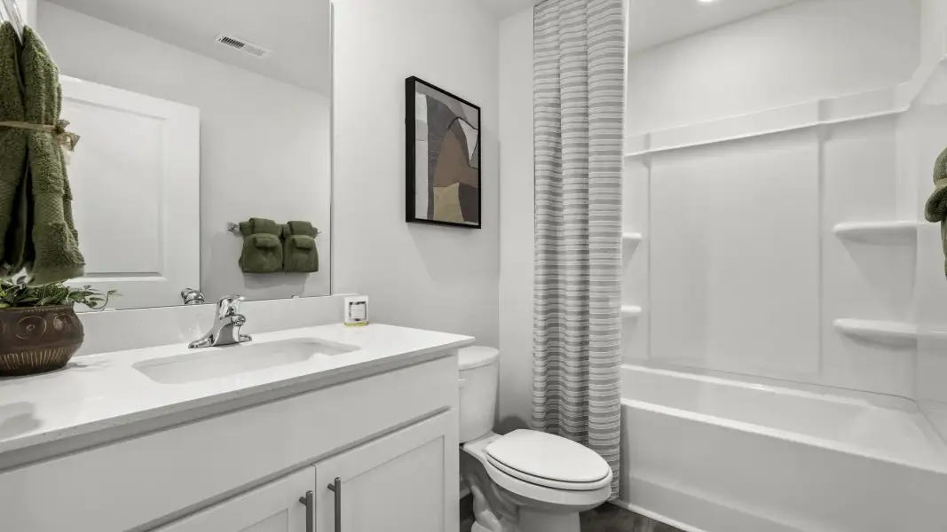 Furnished interior in a model home at Parker Trace in Mocksville (Image 3).