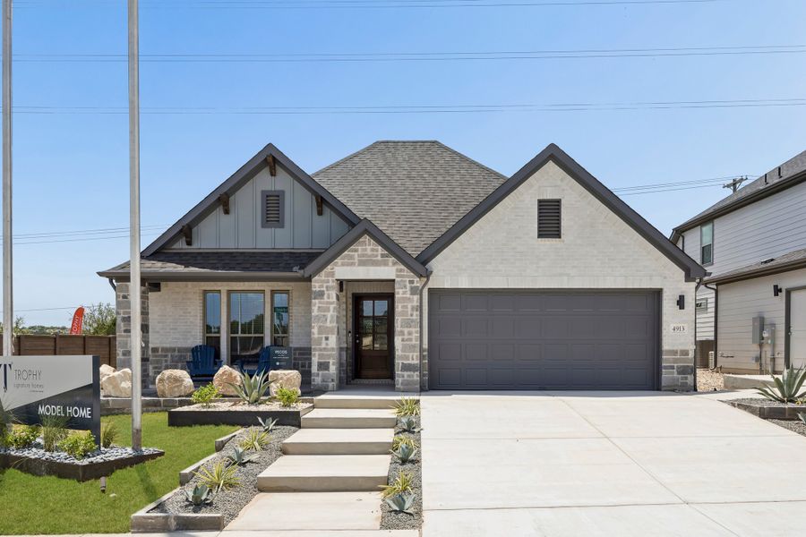 Front exterior of a home in the Evelyn community, located in Austin, TX (Image 3).