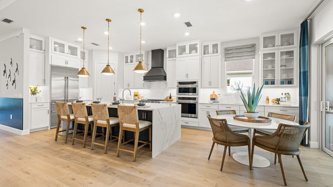 Furnished interior in a model home at Esplanade by the Islands in Naples (Image 45).