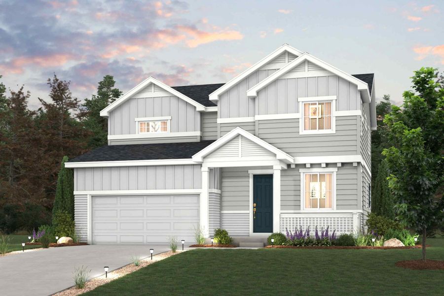 A white house with a driveway.