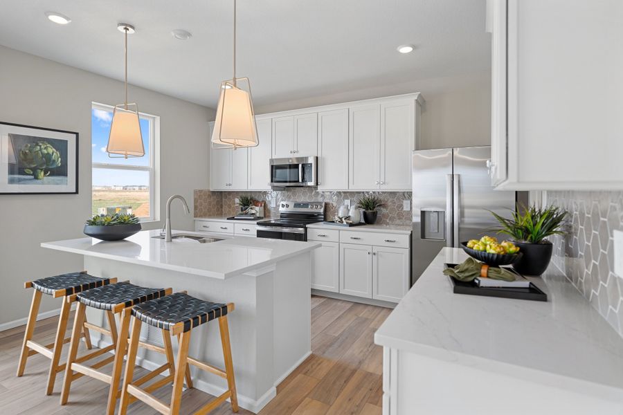 Furnished interior in a model home at Mead Crossing in Mead (Image 5).