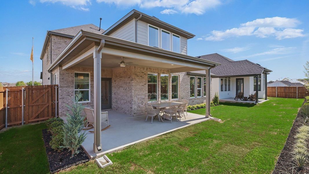 Elegant brick exterior and spacious patio enhance luxury in Green Oaks Preserve. Elegant brick exterior and spacious patio enhance luxury in Green Oaks Preserve.