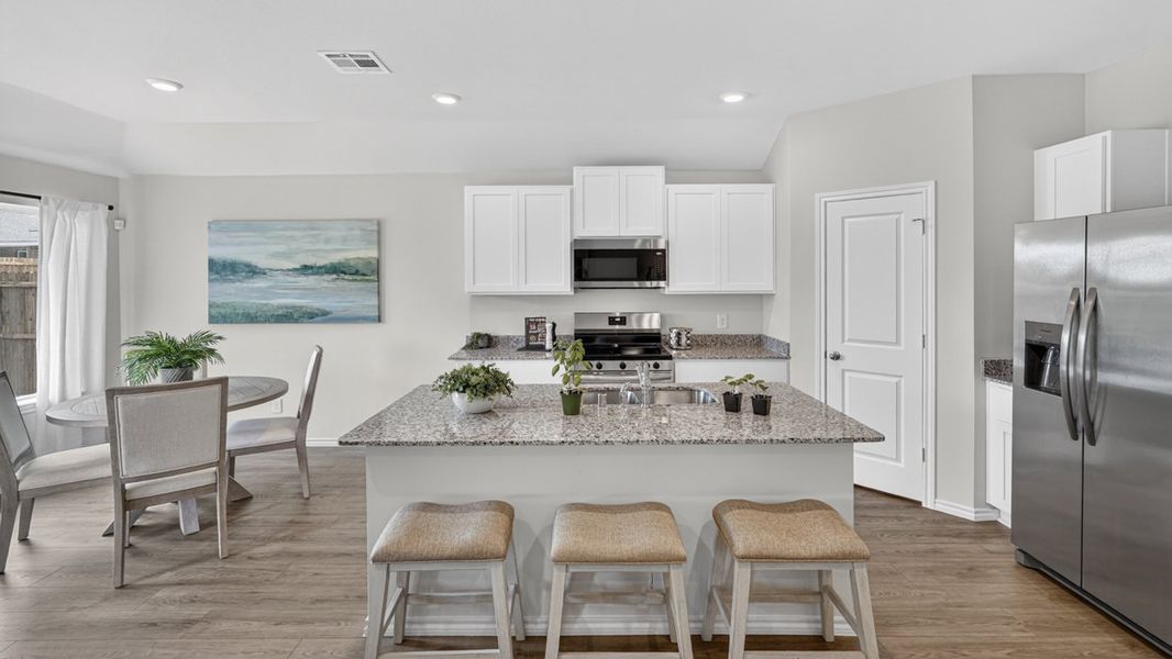 Furnished interior in a model home at Forestbrook Estates in Paris (Image 9).