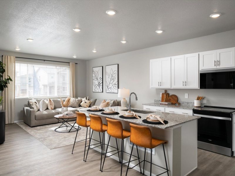 Furnished interior in a model home at York Station in Thornton (Image 4).