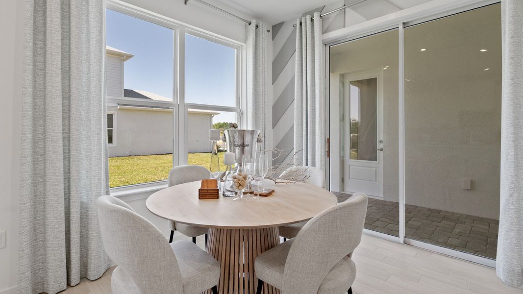 Spacious kitchen, living, and dining areas flow together seamlessly—ideal for everyday living and effortless entertaining.