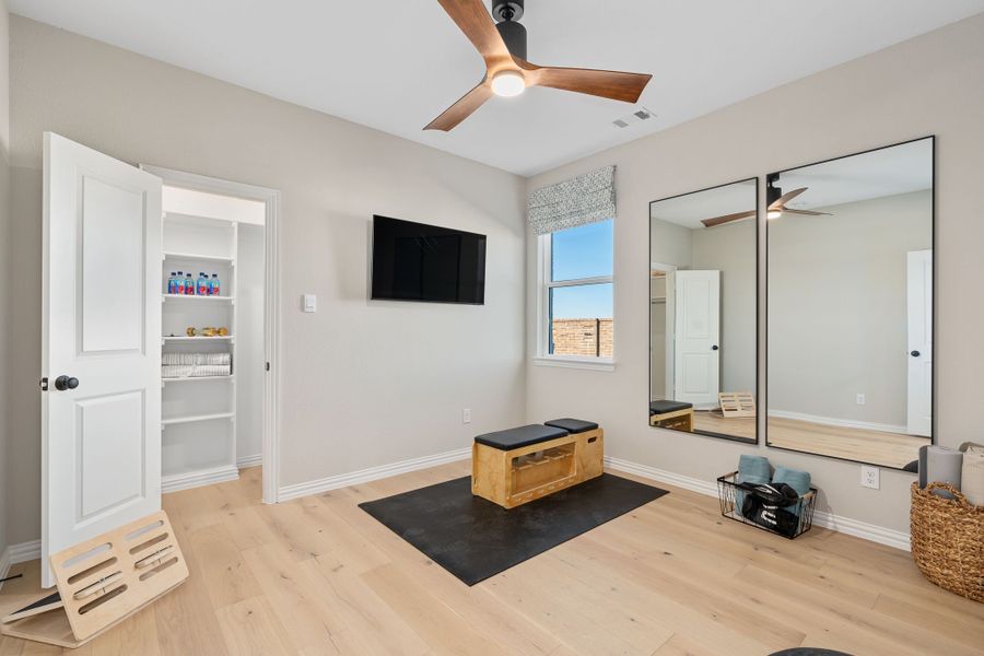 Furnished interior in a model home at Sweetgrass 50s in Haslet (Image 44).