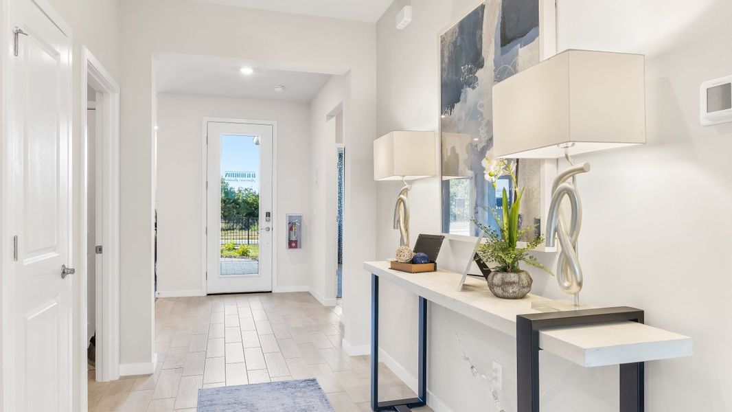 Furnished interior in a model home at Bentley Crossing - Express & Tradition in Fort Myers (Image 8).