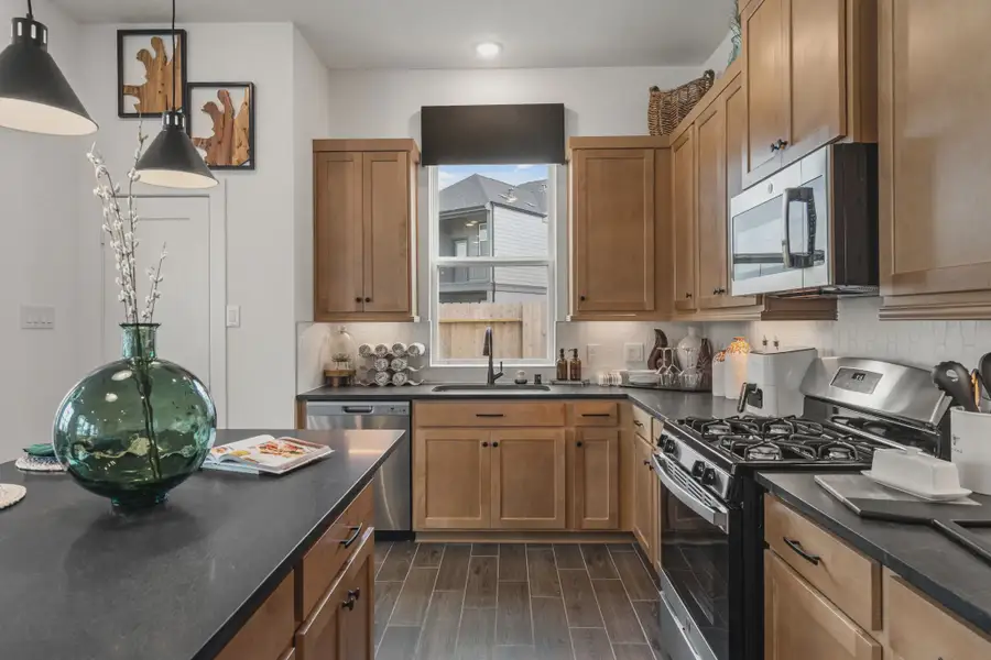 Furnished interior in a model home at Park Hill in Stafford (Image 9).