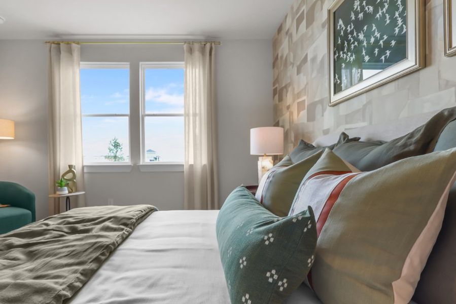 A bed with pillows. A bed with pillows.