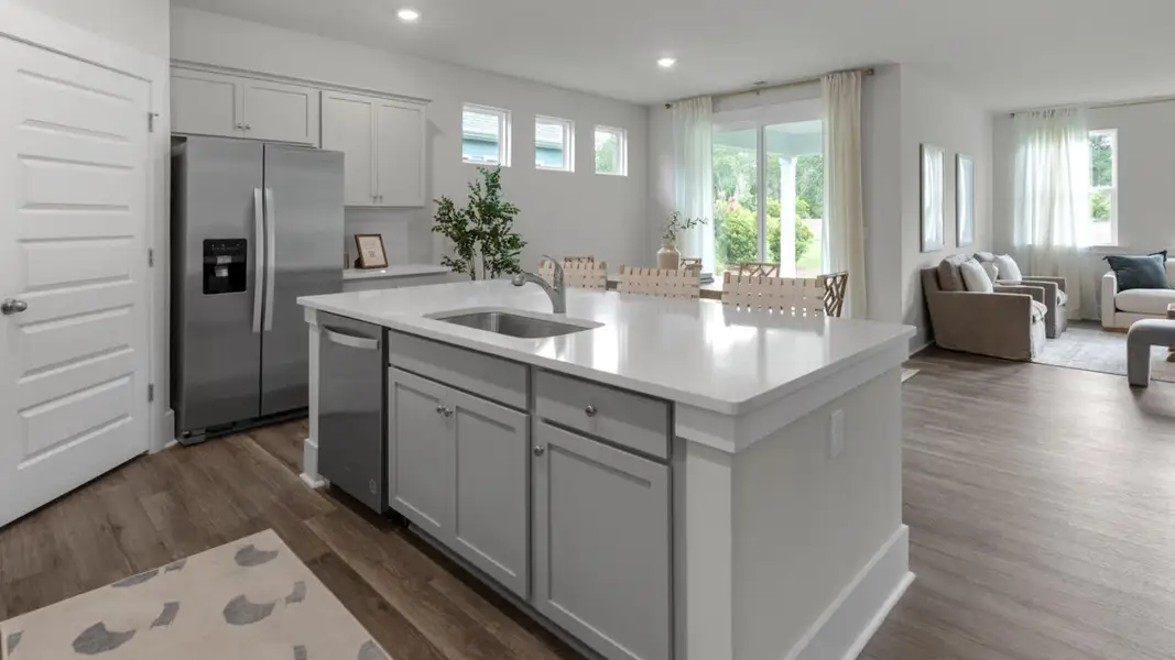 Furnished interior in a model home at The Grove at Blake Farm in Wilmington (Image 10).
