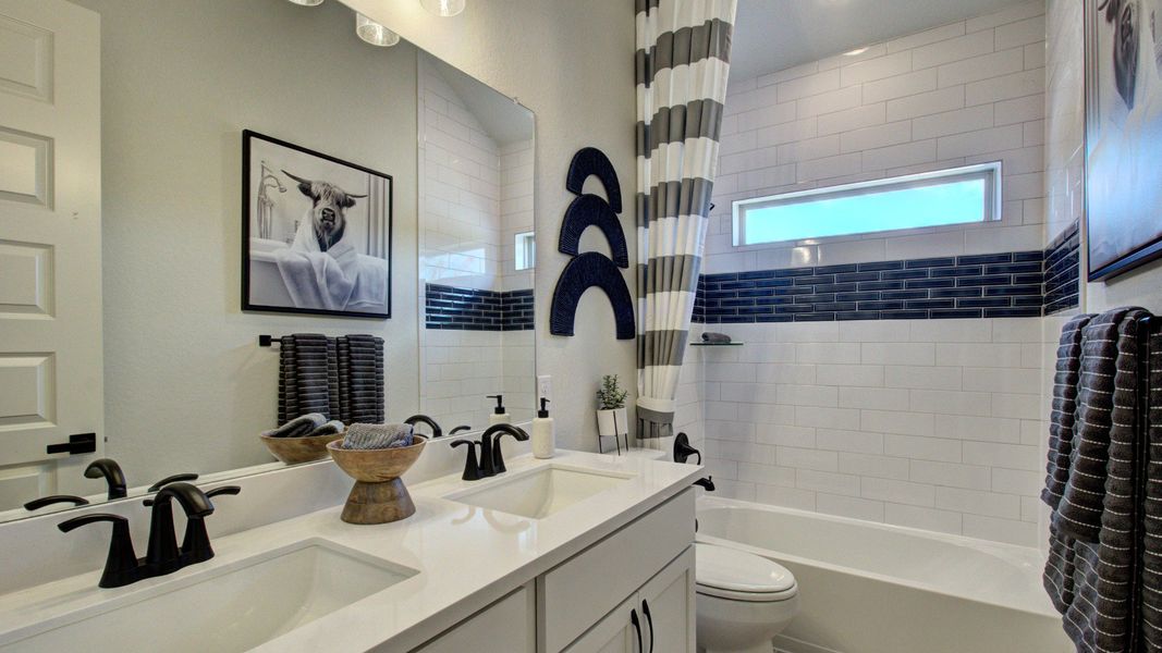 Furnished interior in a model home at The Crossvine in Schertz (Image 24).