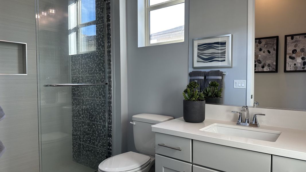 Furnished interior in a model home at CantaMia at Estrella 55+ in Goodyear (Image 10).