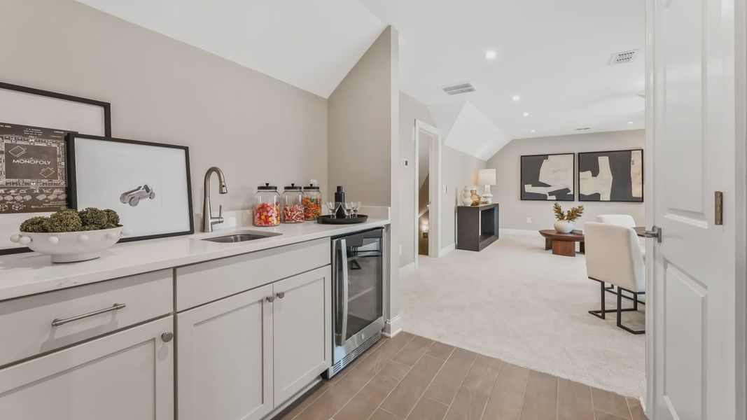 Furnished interior in a model home at The Courtyards at Post Road in Cumming (Image 23).