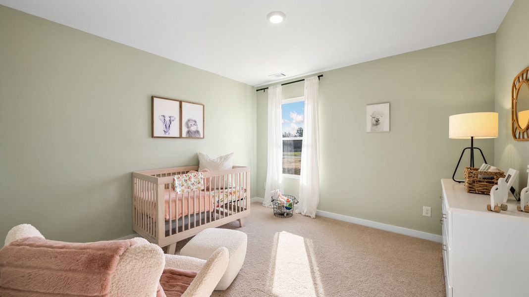 Furnished interior in a model home at Evergreen Landing in Rossville (Image 20).