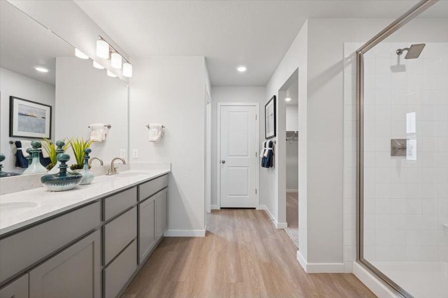 A bathroom with a glass shower.