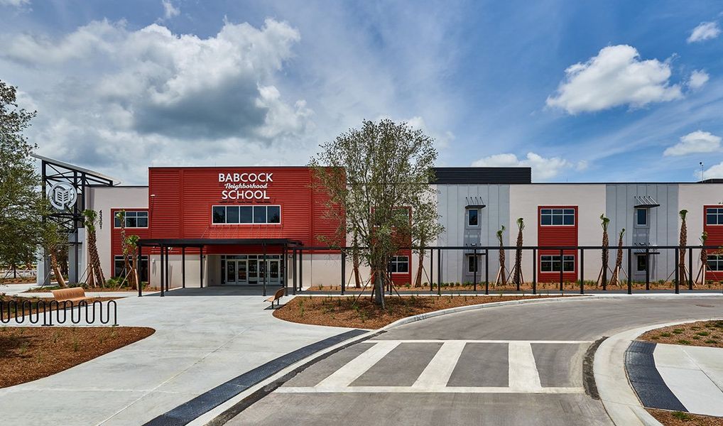 Front exterior of a home in the Palmetto Landing at Babcock Ranch community, located in Punta Gorda, FL (Image 14).