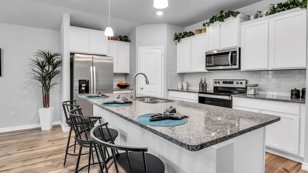 Furnished interior in a model home at Three Creeks - Colt Creek in Belton (Image 6).