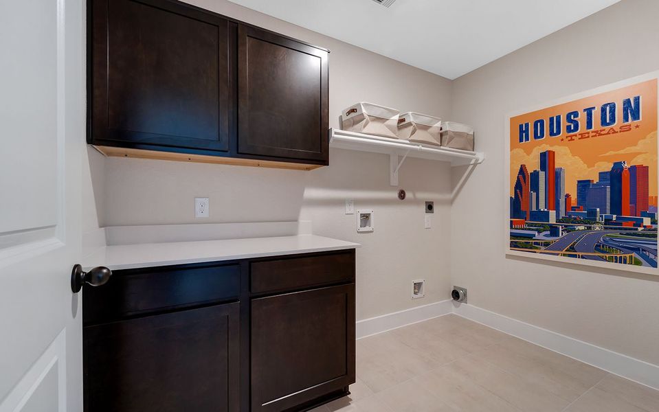 Furnished interior in a model home at Harvest Pointe in Needville (Image 28).