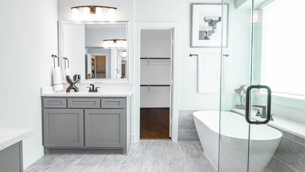 Furnished interior in a model home at Woodcreek in Rowlett (Image 5).