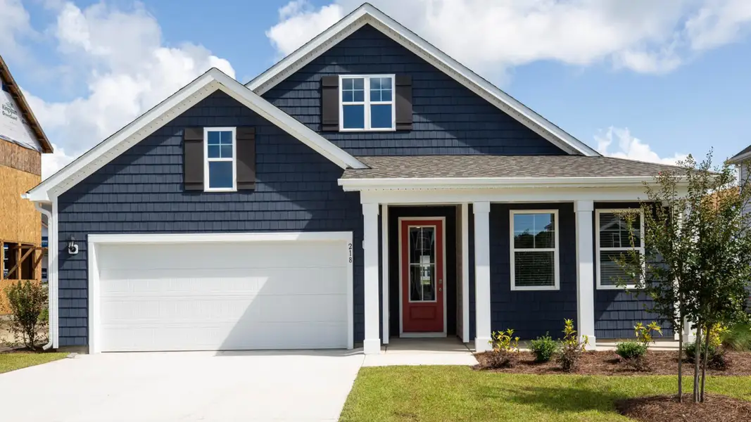 Front exterior of a home in the The Grove at Blake Farm community, located in Wilmington, NC (Image 4).