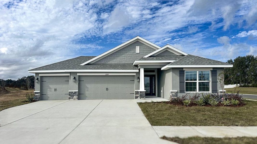 Front exterior of a home in the Densan Park community, located in Oxford, FL (Image 4).
