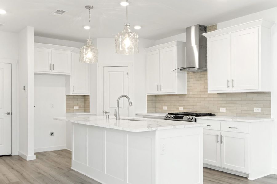 Furnished interior in a model home at Windsong Ranch Townhomes in Prosper (Image 13).