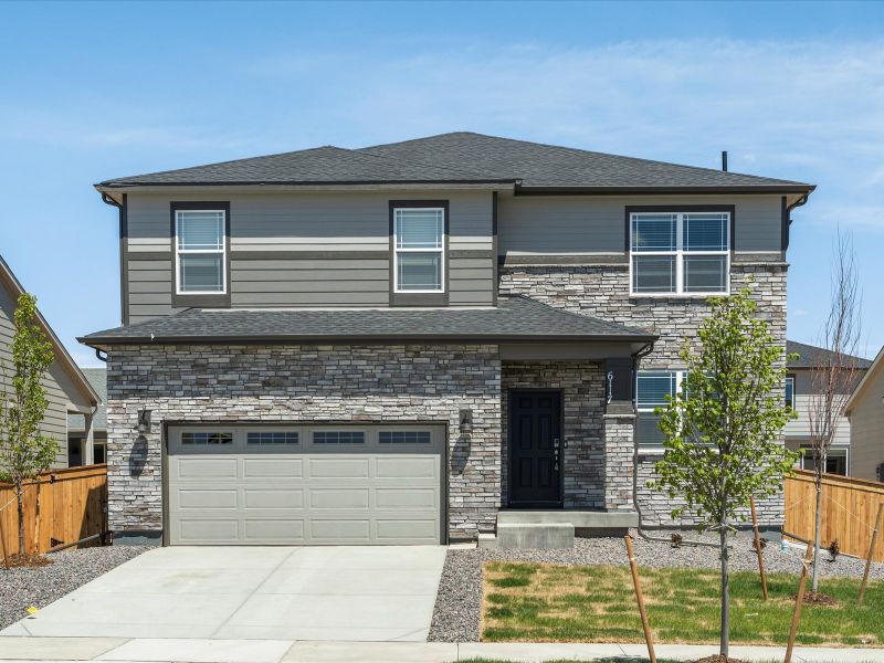 Waterton front exterior at a Meritage Homes community in Brighton, CO.