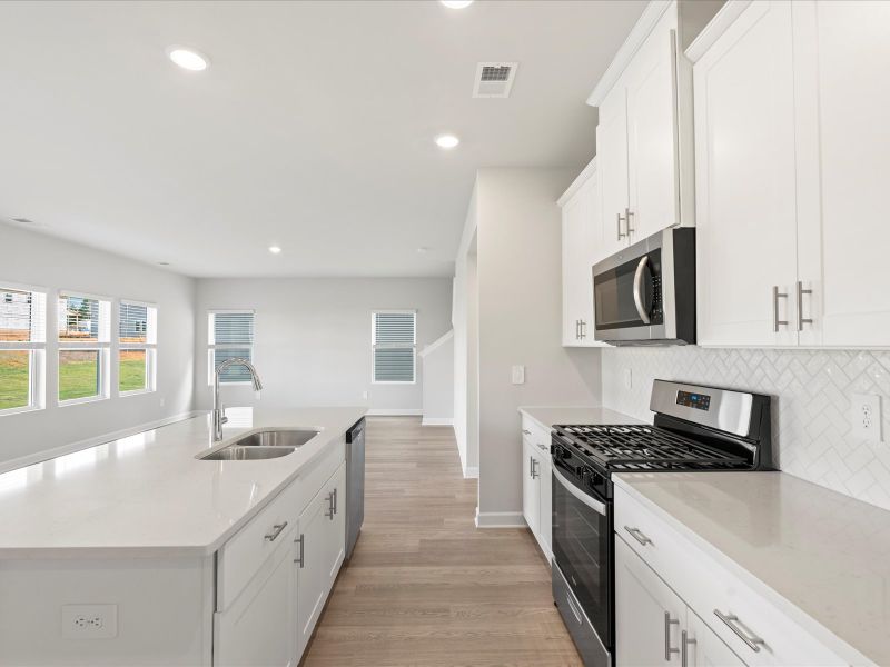 Furnished interior in a model home at Chatham Forest in Duncan (Image 6).