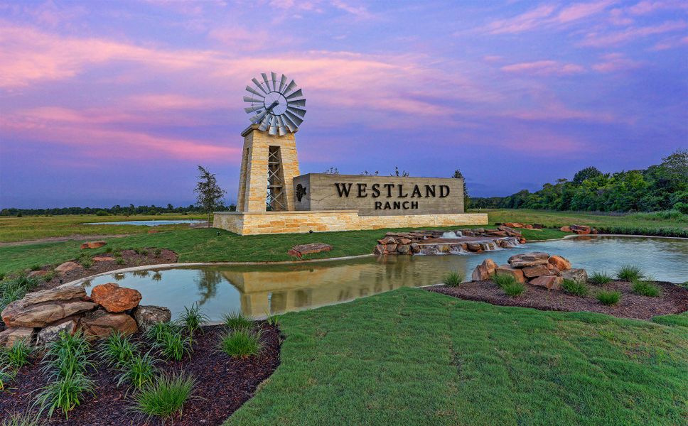 Main entrance to the Westland Ranch master-planned community in League City, TX, featuring its landmark signage (Image 1).