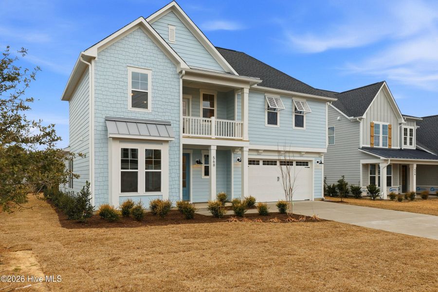Front exterior of a home in the Windwater community, located in Hampstead, NC (Image 25). Front exterior of a home in the Windwater community, located in Hampstead, NC (Image 25).