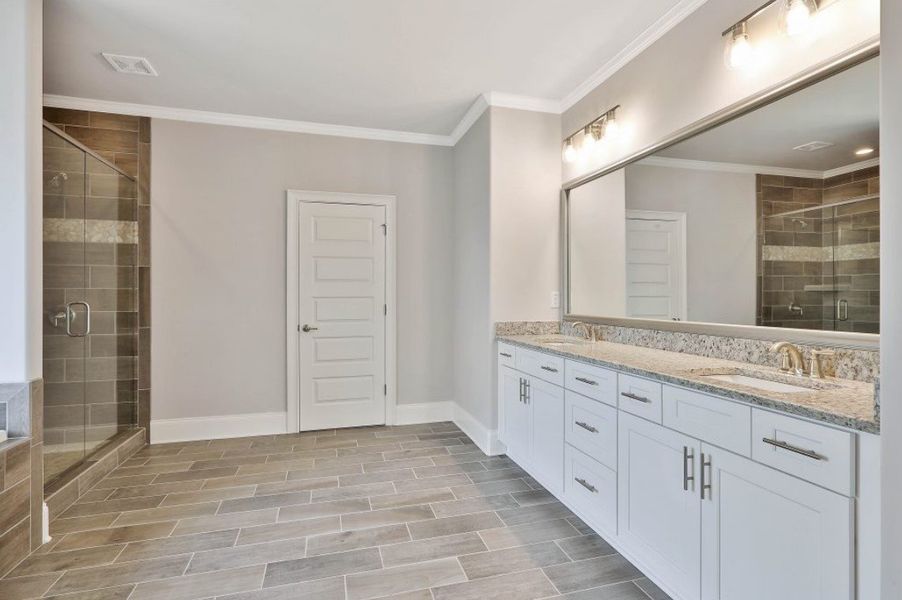 Furnished interior in a model home at Estates at Dorsett Bridge in Douglasville (Image 6).