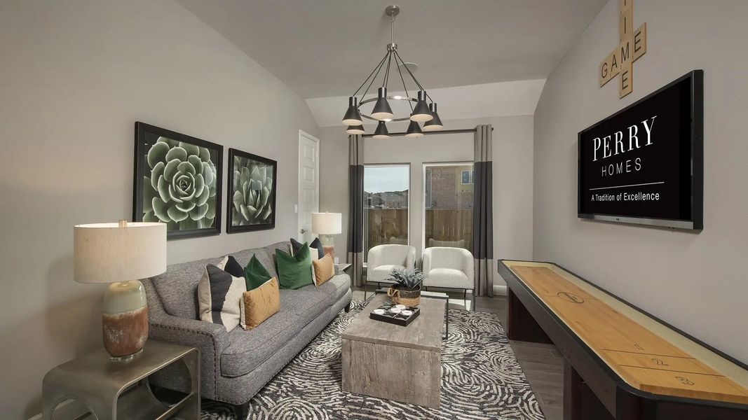 Furnished interior in a model home at Lakes Of Cane Island 55' in Katy (Image 9).