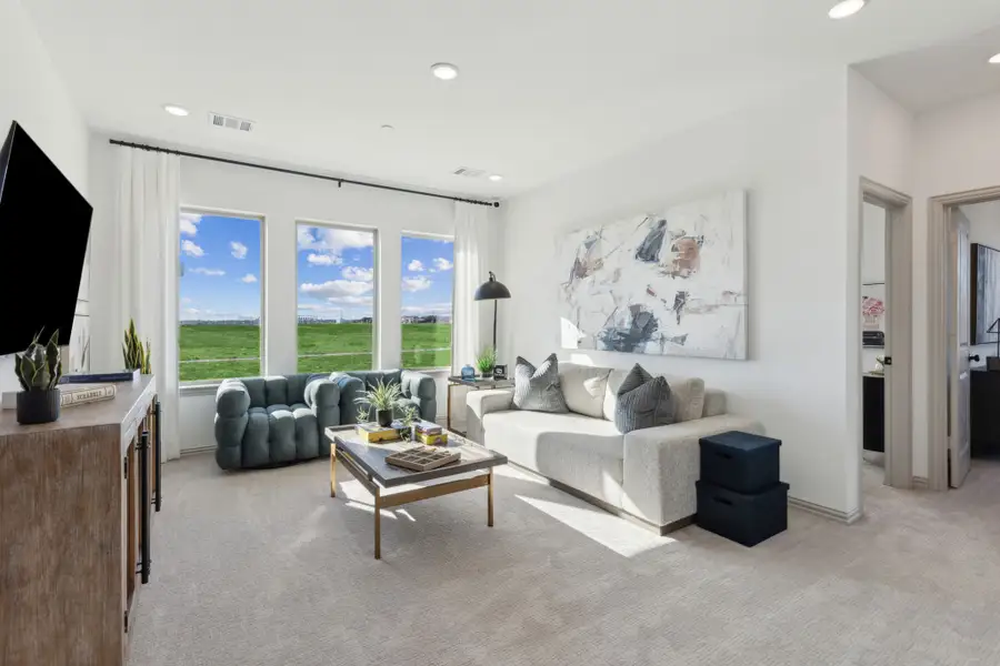 Furnished interior in a model home at The Village at Midtowne in Midlothian (Image 11).