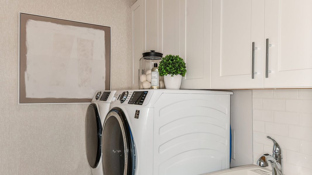 Furnished interior in a model home at Esplanade by the Islands in Naples (Image 55).