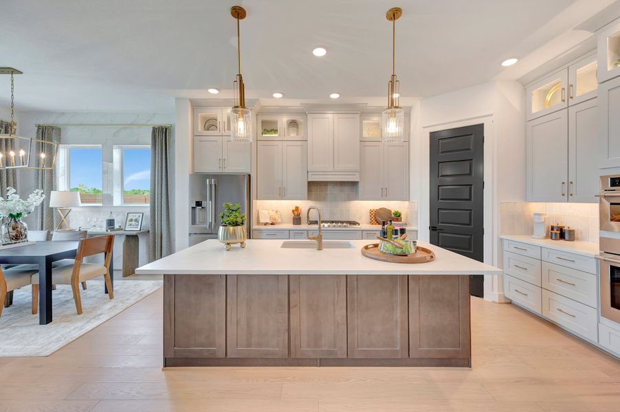 Furnished interior in a model home at Bridgeland Central: Emerald Heights - Enclave Collection in Cypress (Image 6).