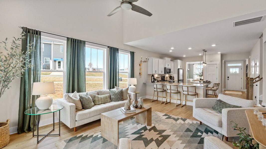 Notable family room designed with high standards—perfect for both everyday living and entertaining at Barton Hollow