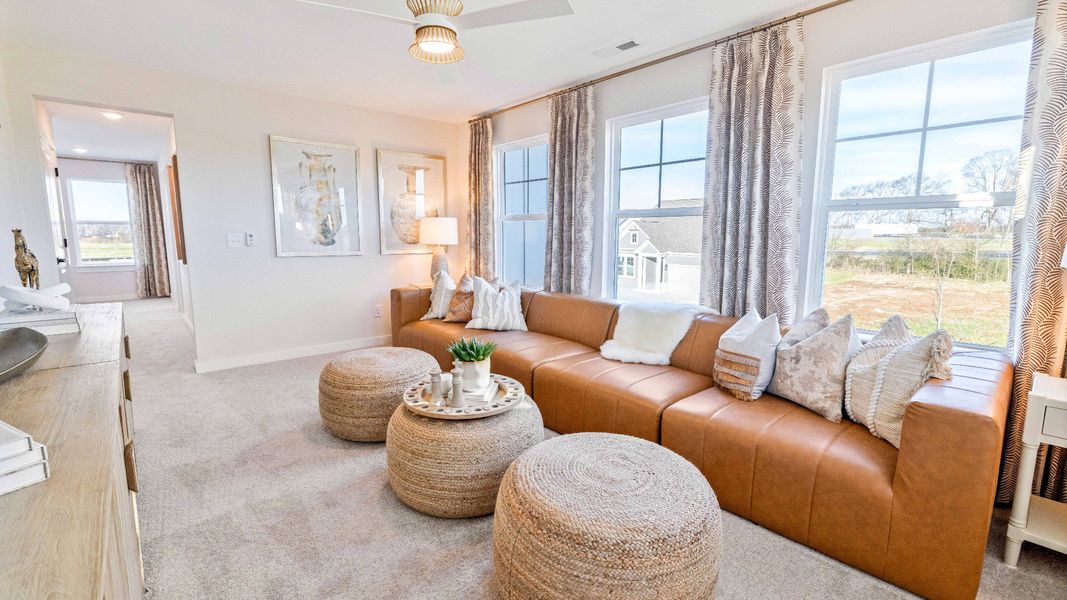 Large bonus room/loft area offering an additional space to gather for games, movies, and more