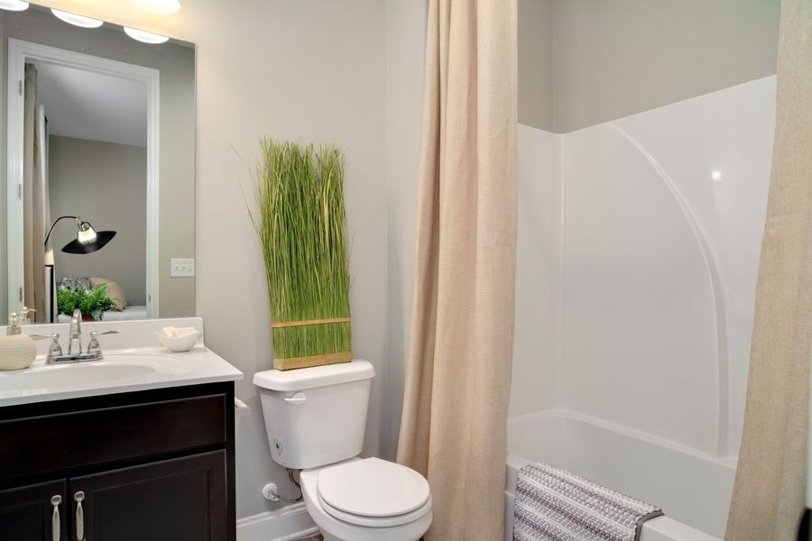 Furnished interior in a model home at Harvest Point in Spring Hill (Image 13).