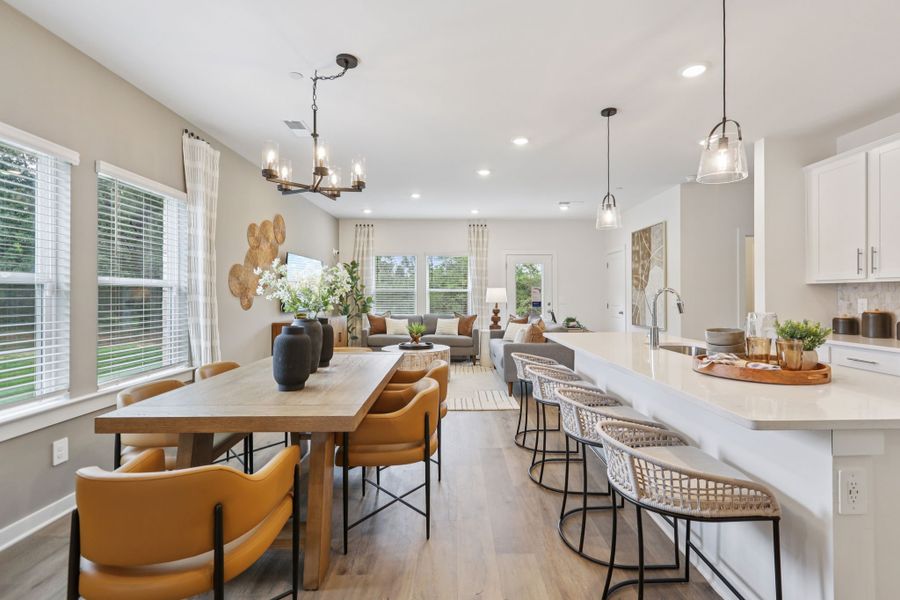 Furnished interior in a model home at Cedarcrest Townhomes in Fairview (Image 9).