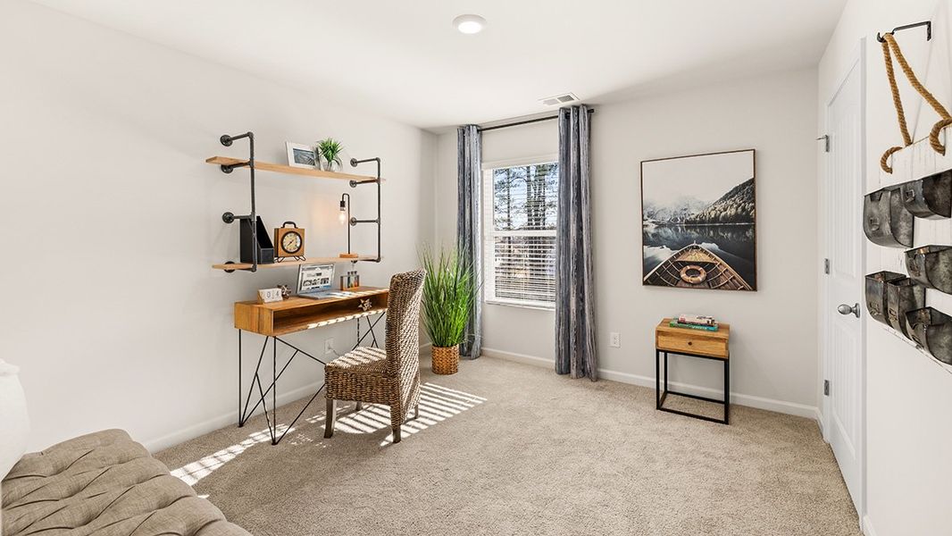 Furnished interior in a model home at Thompson Ridge in Dallas (Image 39).